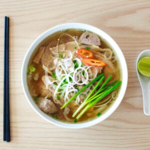 Best Ramen soup recipes with all the fixings served in a white bowl. Photo by Quang Nguyen Vinh.